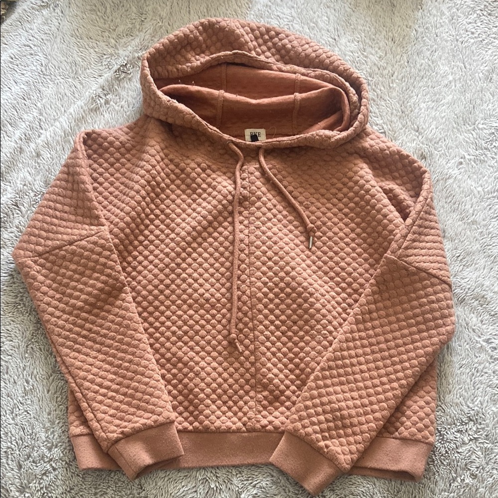 Quilted peach colored hoodie